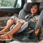 when can a baby front face in a car seat