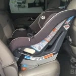 when do babies sit forward in car seat